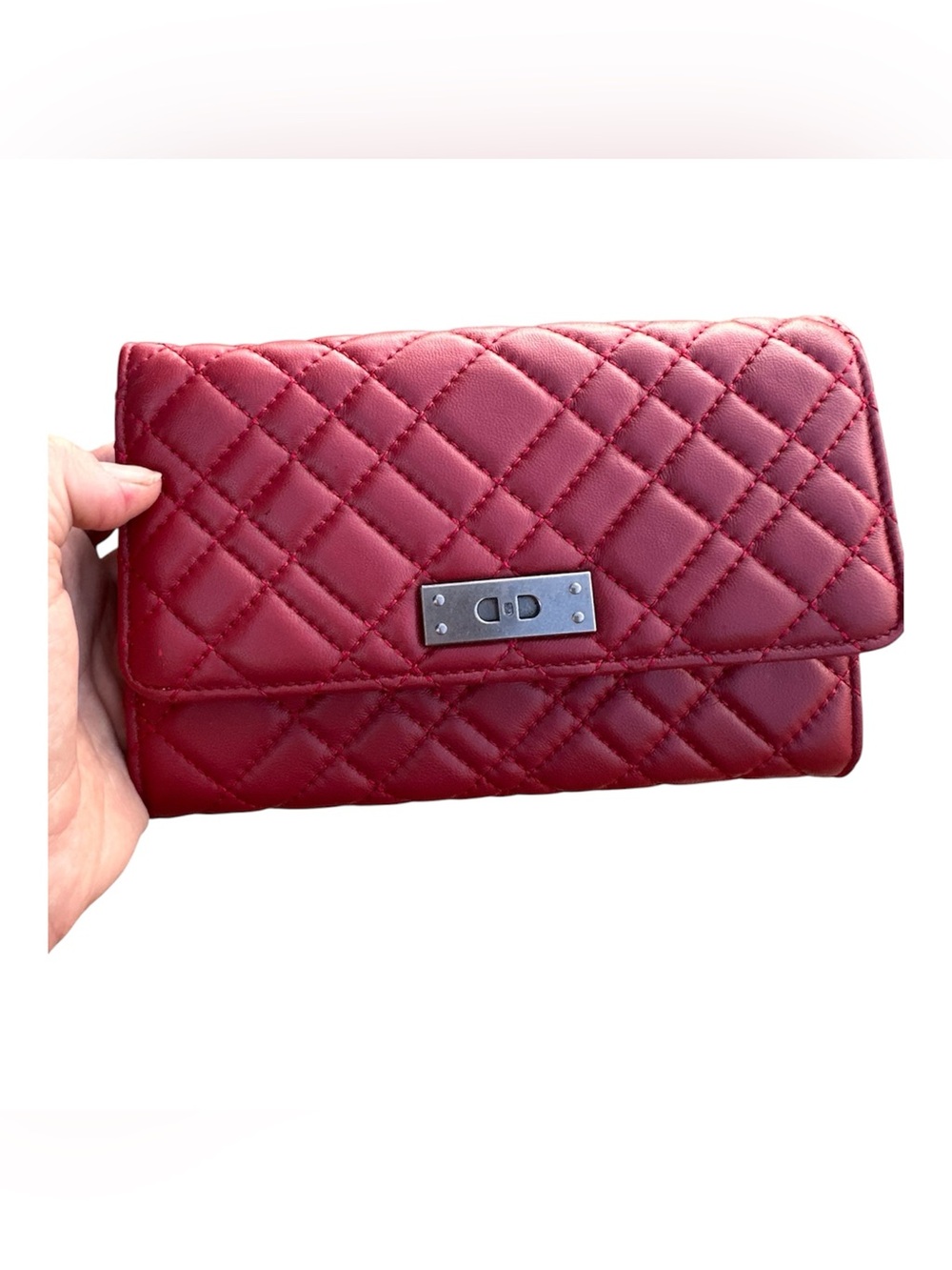 Kurt Geiger red clutch with broken lock ring